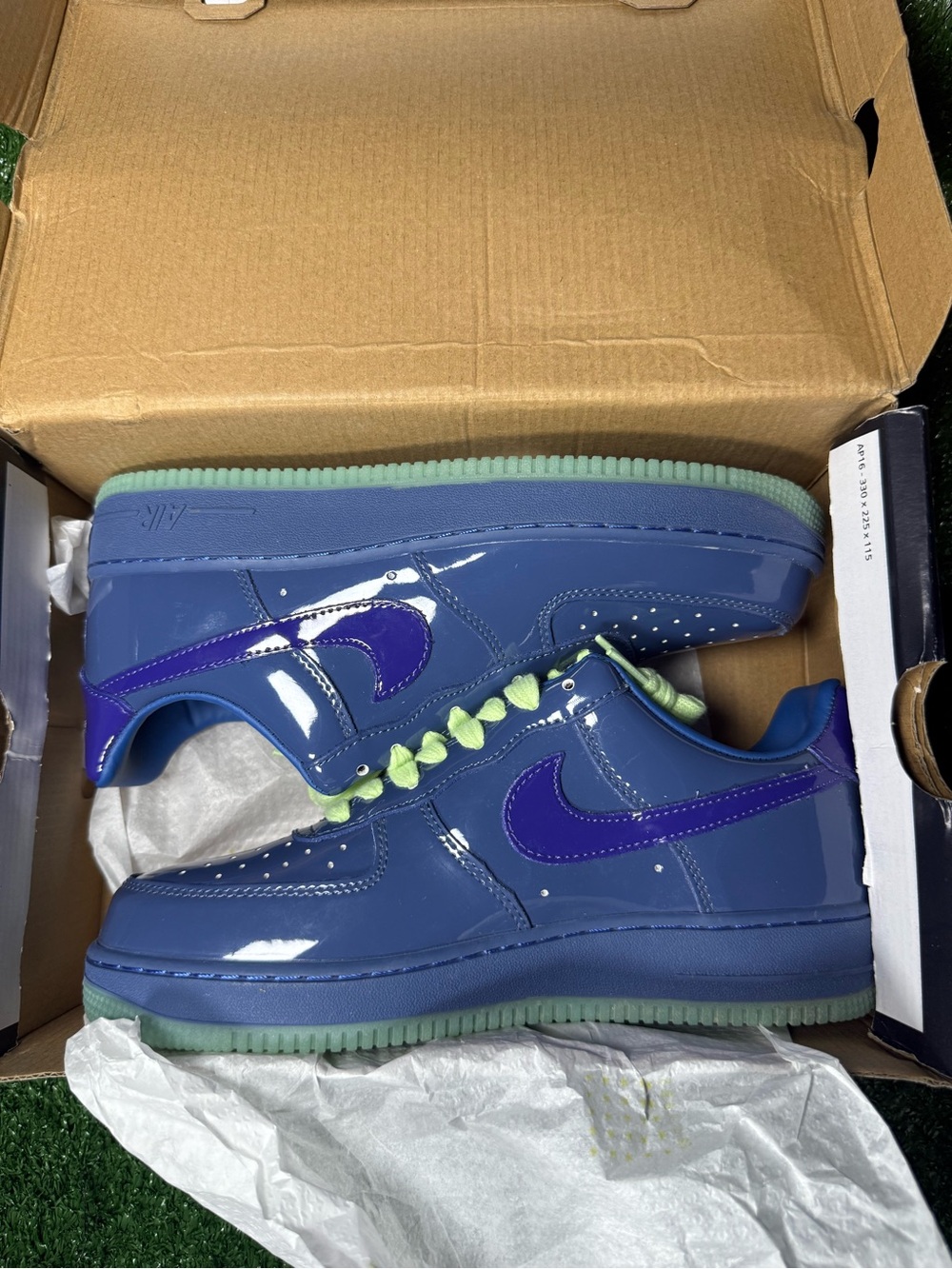 Nike Kids' Low-Top Sneakers in Blue with Purple Swoosh